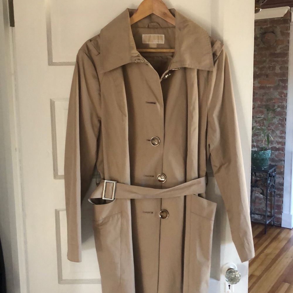 Belted tan trench coat